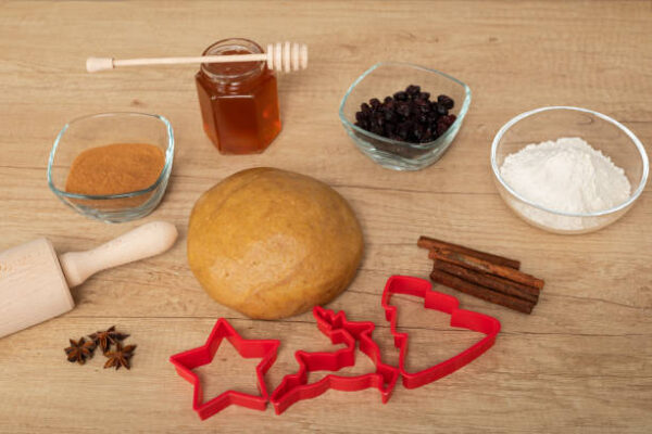 Christmas recipes homemade gingerbread dough on wooden background