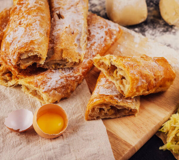 Sweet apple strudel with apples top view